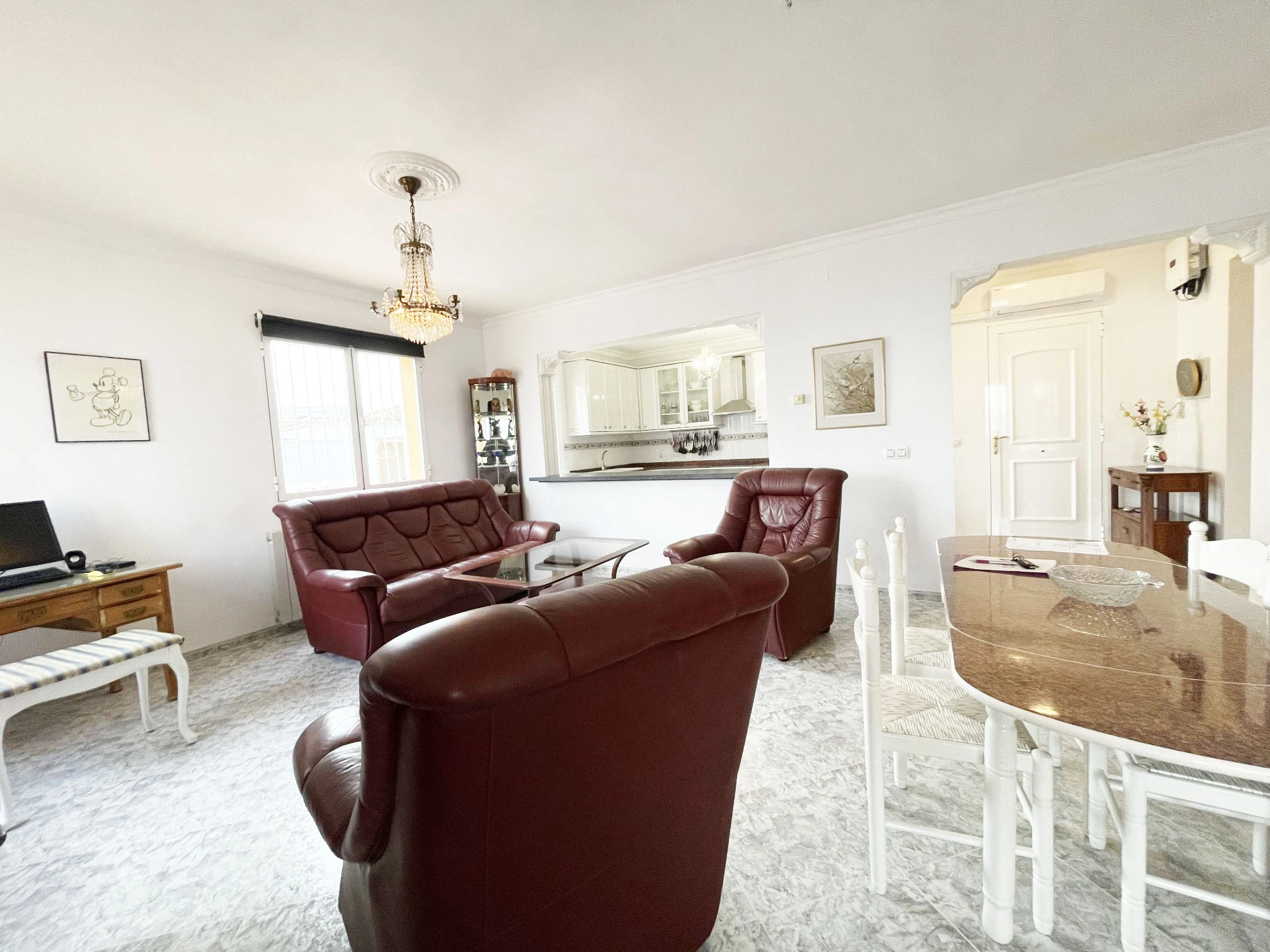 Living room connected to fully equipped kitchen at detached villa in Calpe