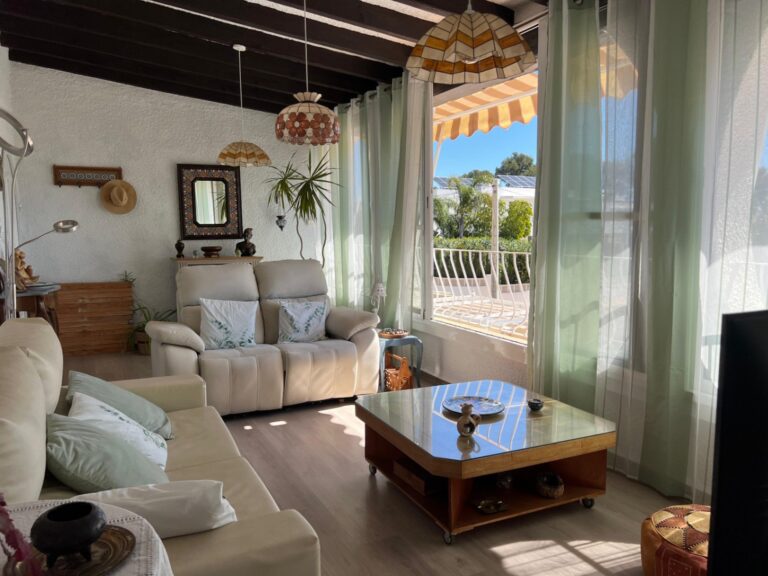 Living room with terrace access at Mediterranean villa in Buena Vista Benissa
