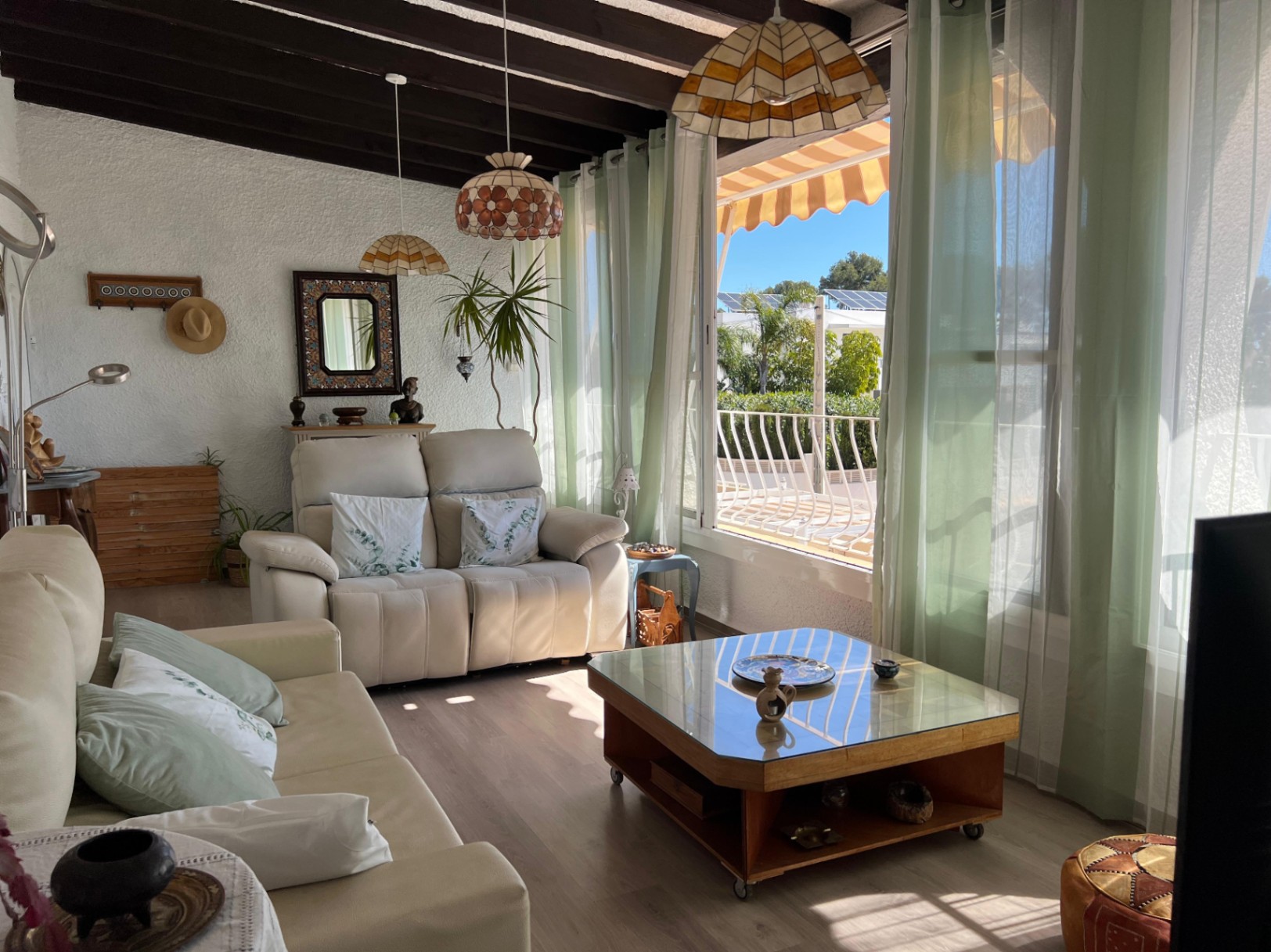 Living room with terrace access at Mediterranean villa in Buena Vista Benissa