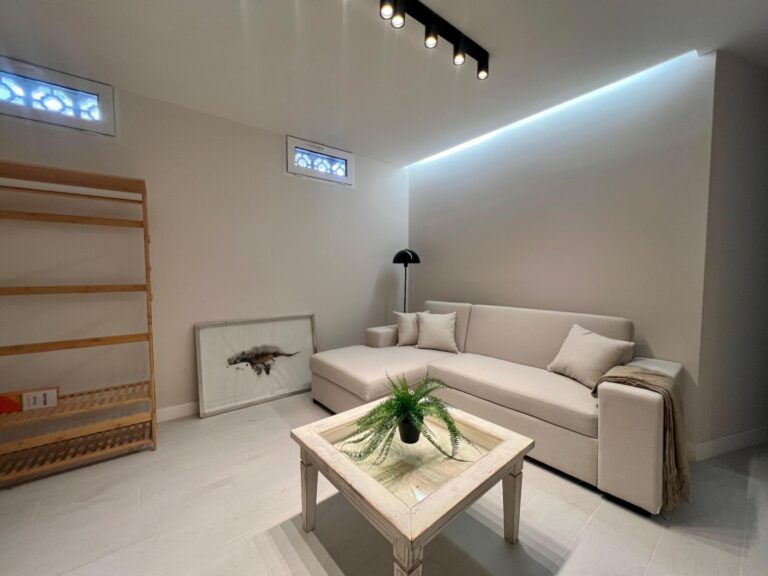 Lounge area on lower level at modern three-level villa in Moraira