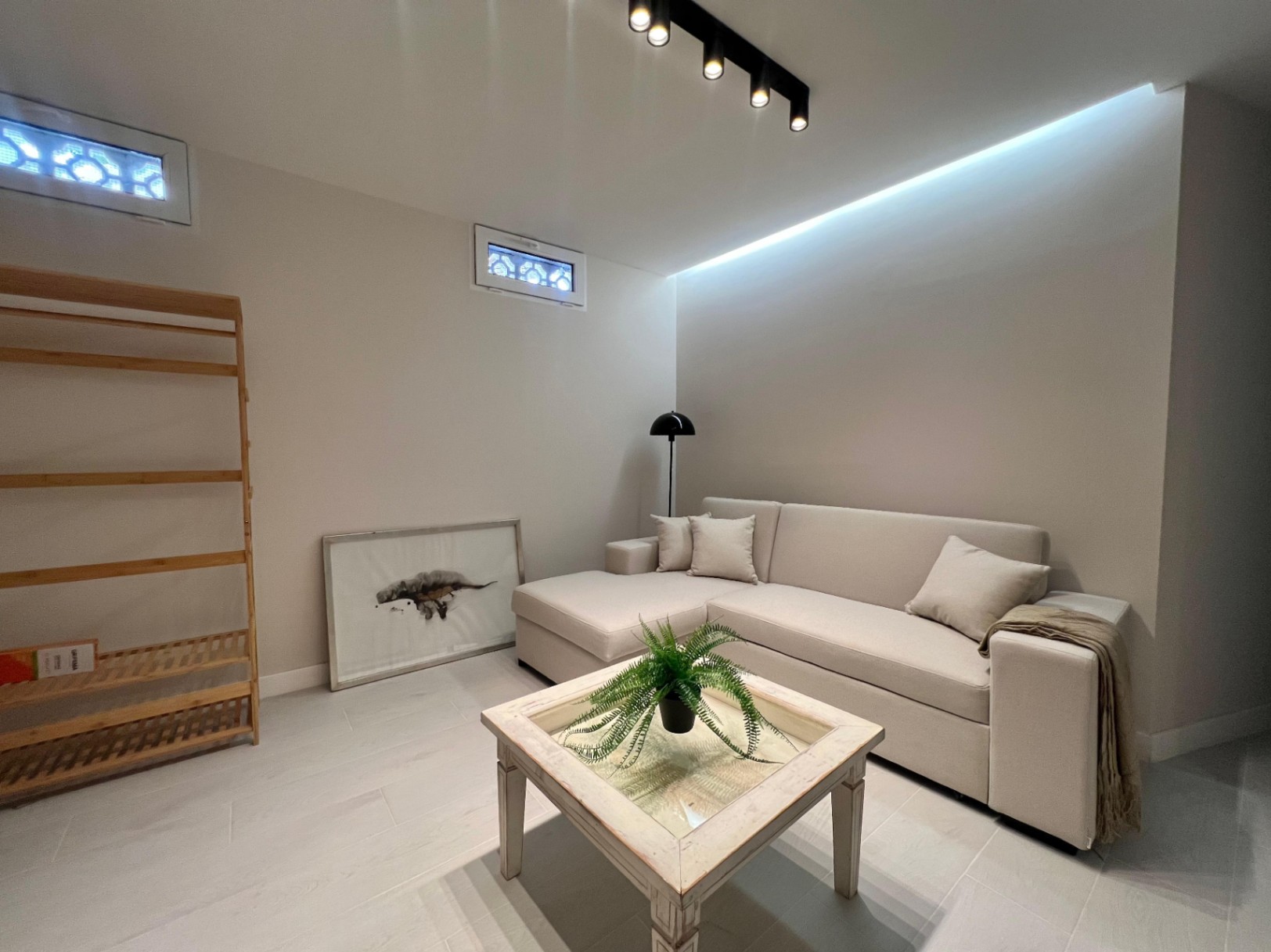 Lounge area on lower level at modern three-level villa in Moraira