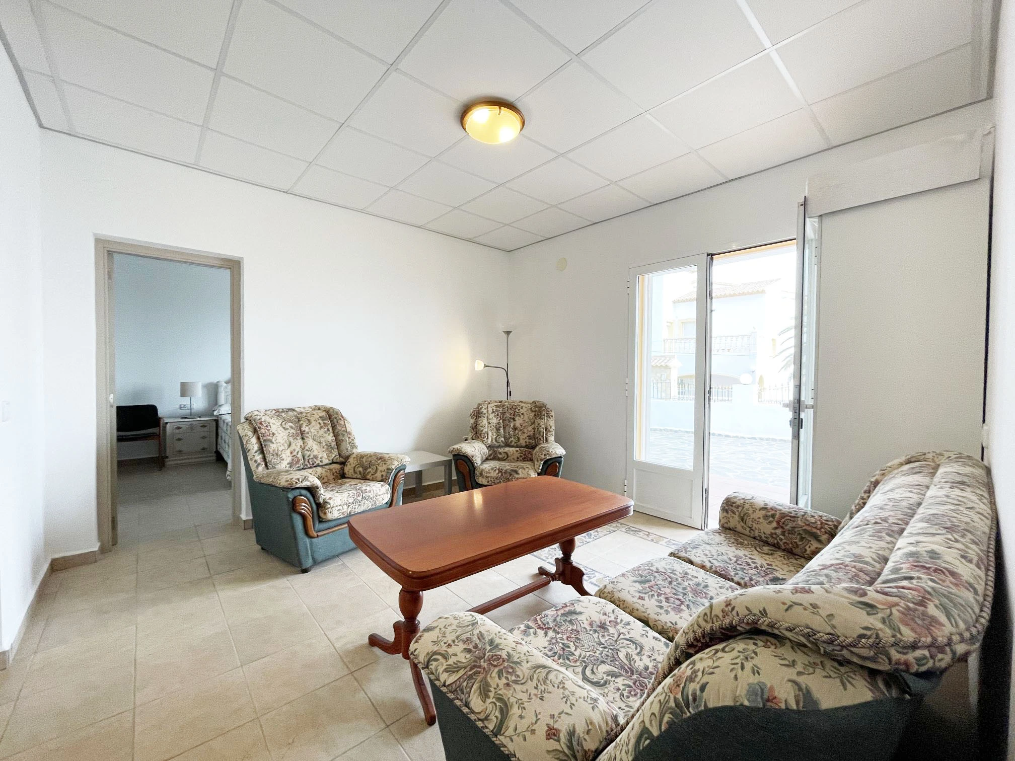 Lounge area with terrace access at detached villa in Calpe