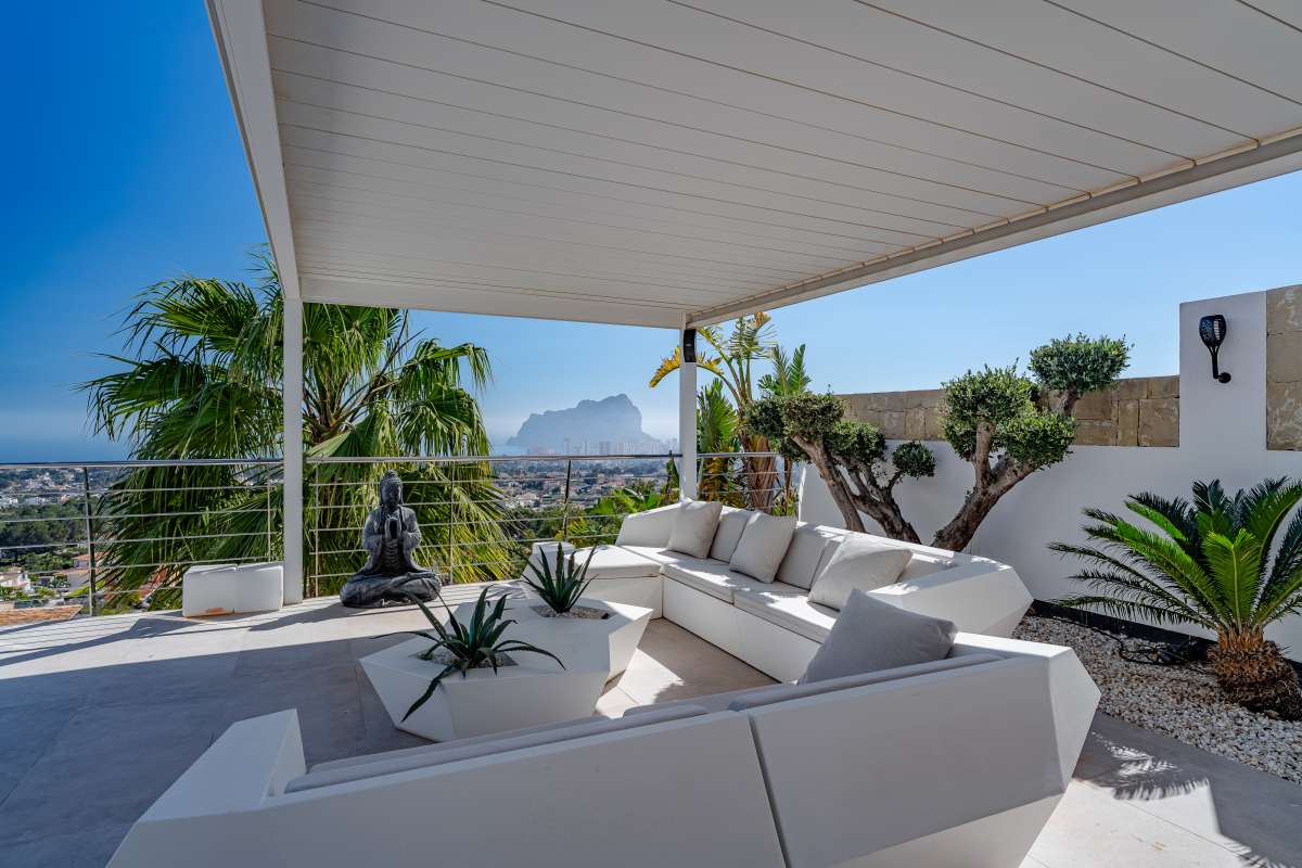 Lounge terrace with outdoor seating, bioclimatic pergola and panoramic sea views at a luxury villa in Gran Sol, Calpe.