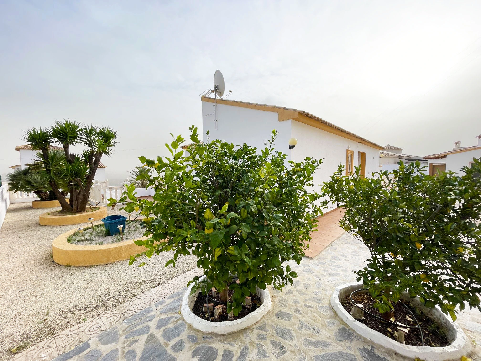 Low-maintenance garden at detached villa in Calpe