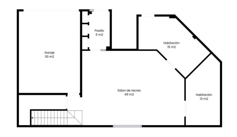 Lower-level floor plan of a private villa in Calpe showing garage, living space, bedroom and bathroom layout