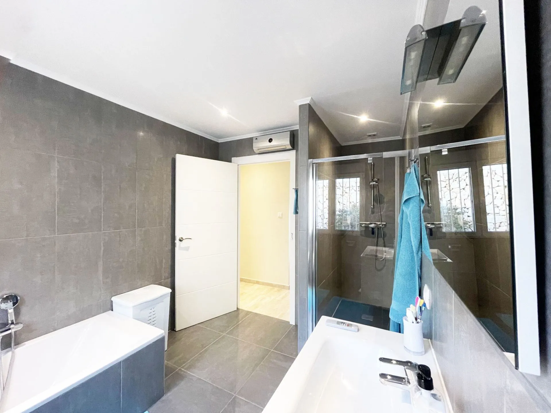 Main bathroom with walk-in shower at renovated villa in Calpe`