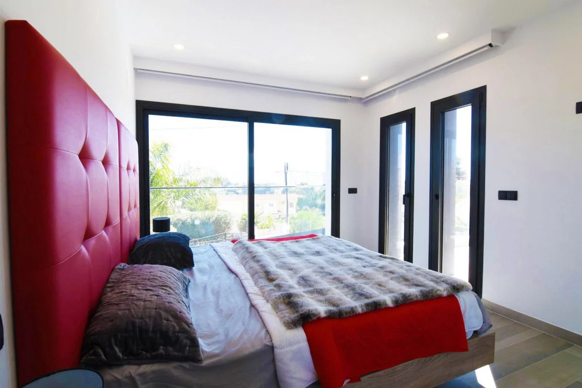 Main bedroom with terrace access in modern villa in Carrió, Calpe
