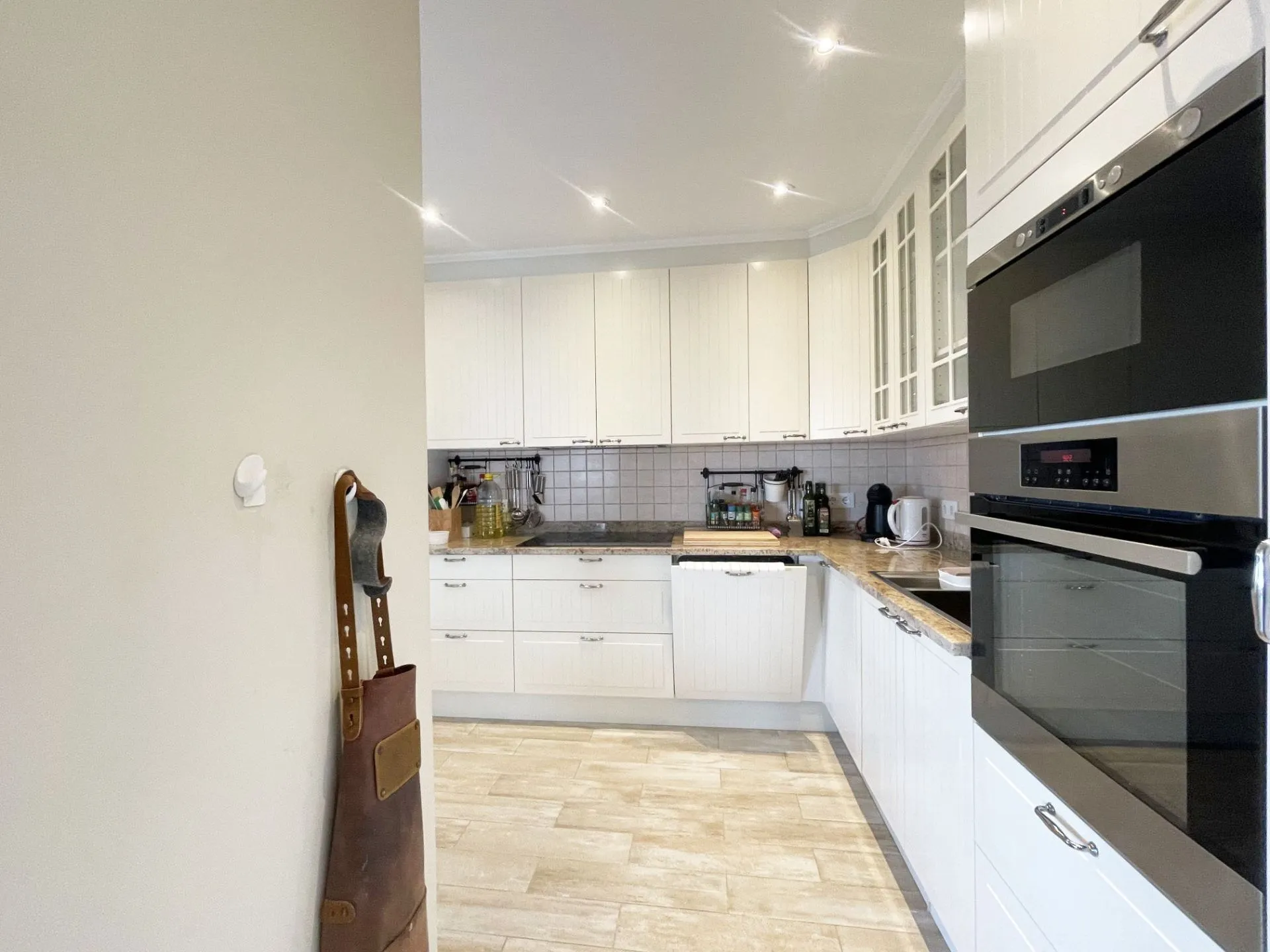 Main kitchen with built-in oven at renovated villa in Calpe
