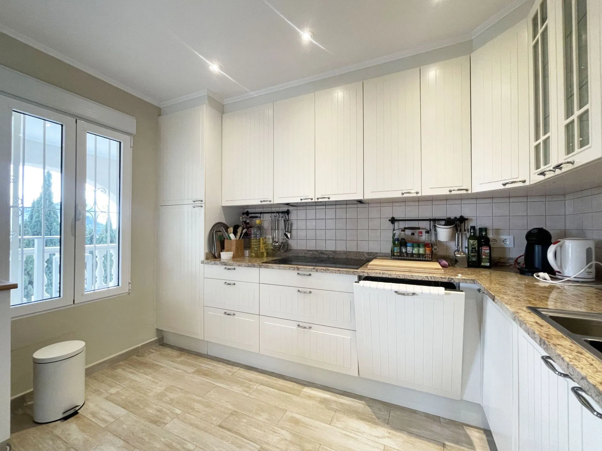 Main kitchen with terrace window at renovated villa in Calpe