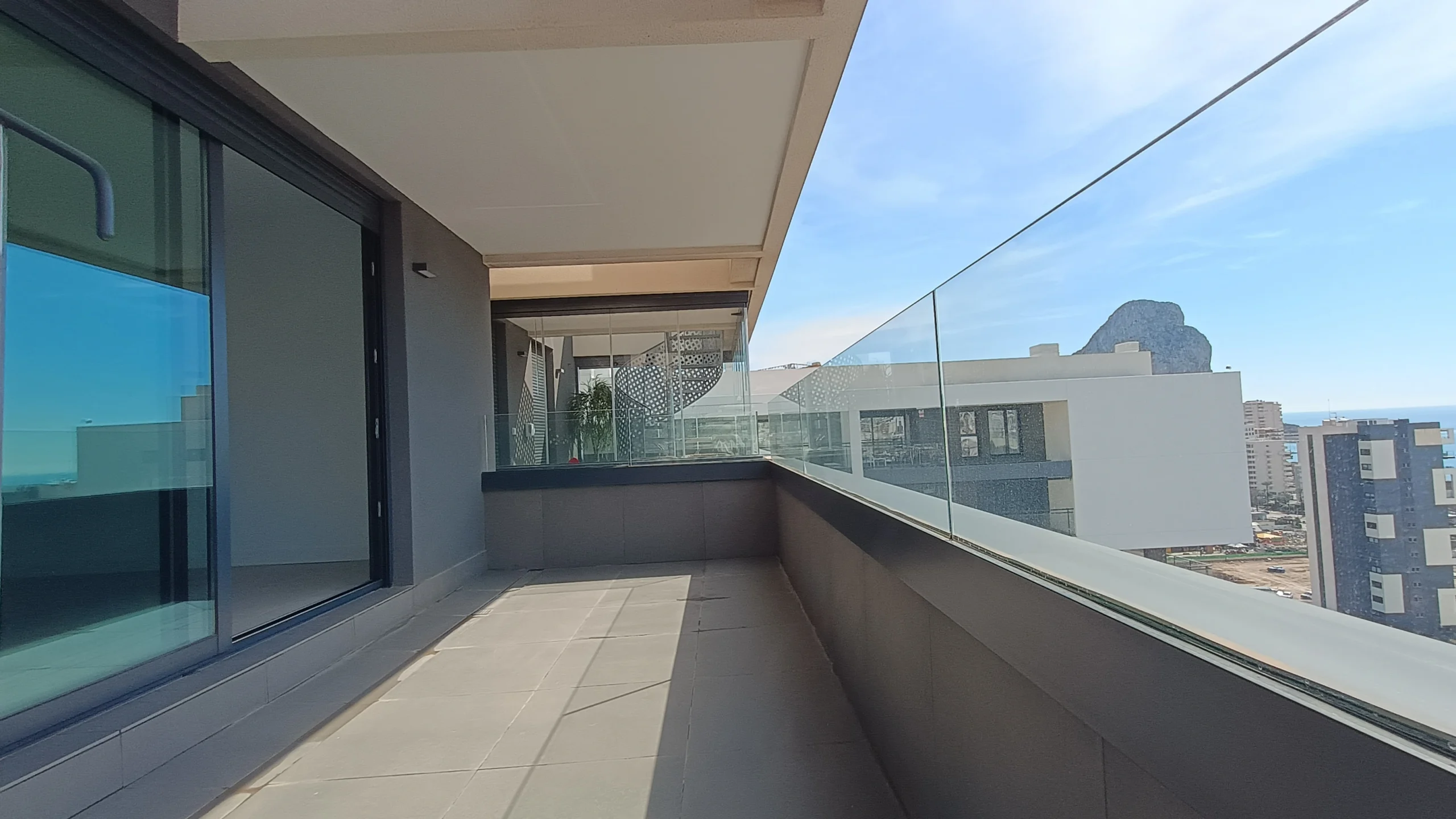 Main terrace with views towards the Peñón de Ifach at luxury penthouse in Calpe