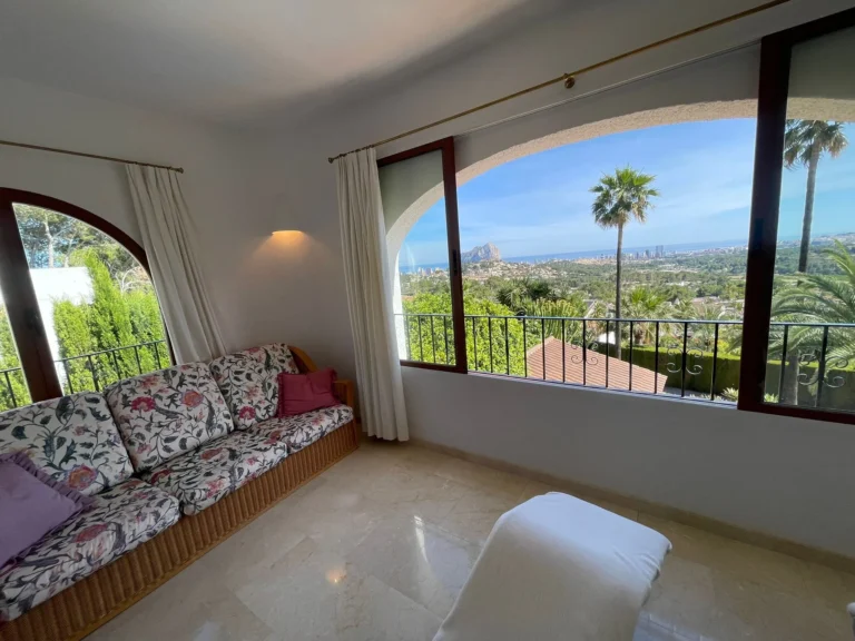 Master bedroom lounge area with sea views and views towards the Peñón de Ifach inside a villa in Calpe.
