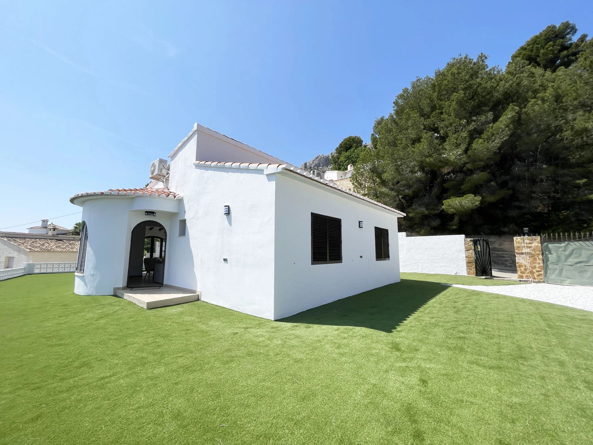 Mediterranean garden with cactus at villa in Oltamar, Calpe