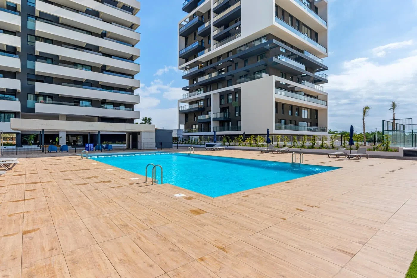 Modern apartment complex with communal pool in Arenal-Bol, Calpe