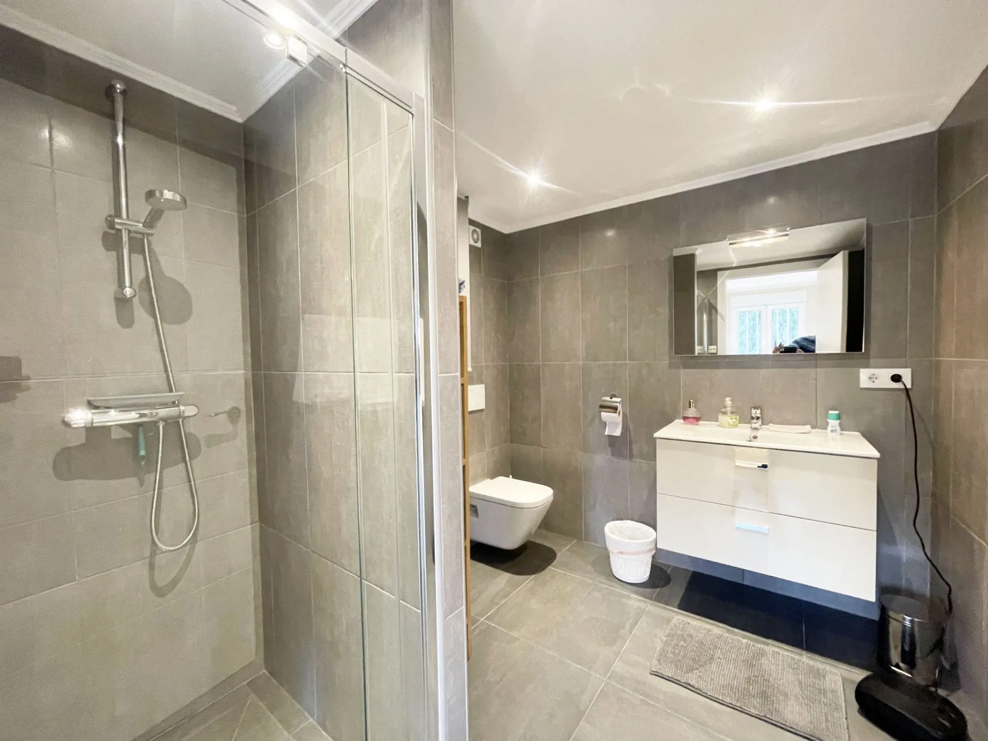 Modern bathroom with walk-in shower at renovated villa in Calpe