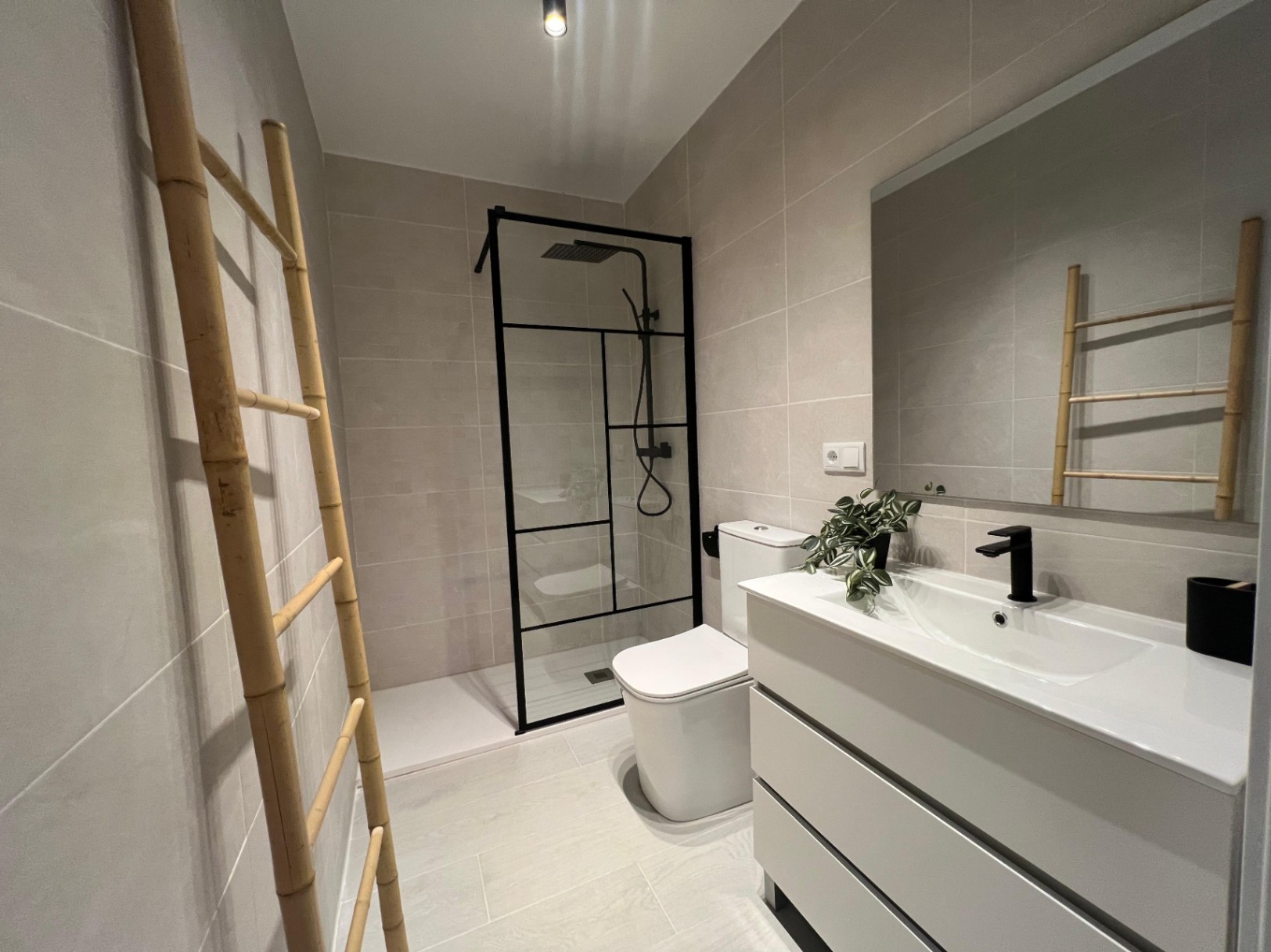 Modern bathroom with walk-in shower at three-level villa in Moraira