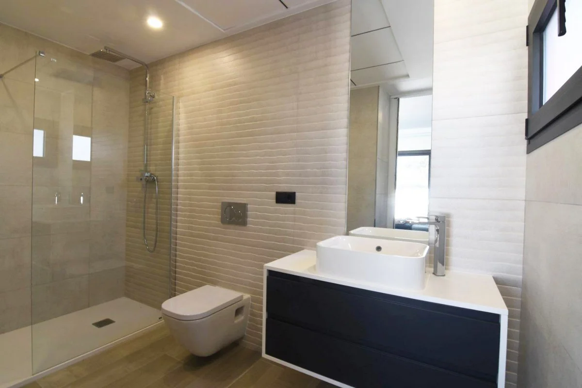 Modern bathroom with walk-in shower in villa in Calpe