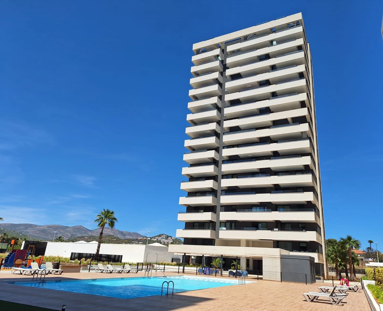 Modern penthouse complex in Calpe with communal swimming pool`