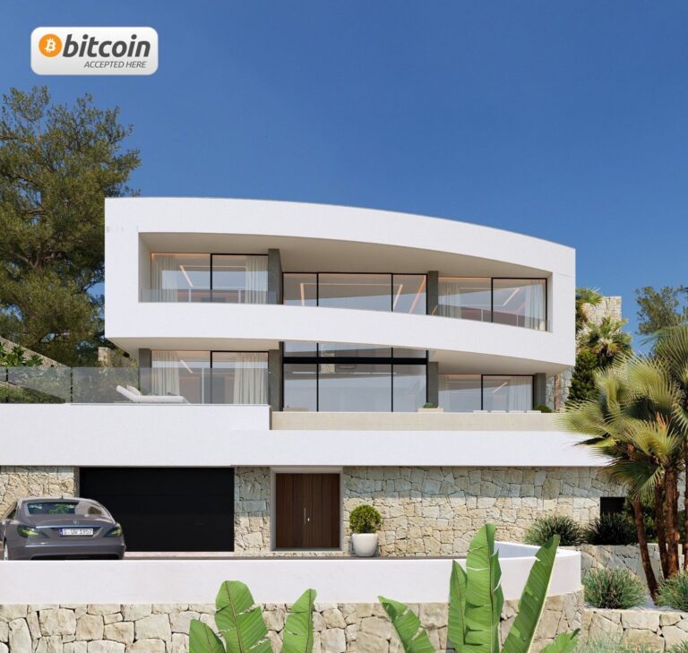 Modern villa exterior in Calpe with garage and sea views