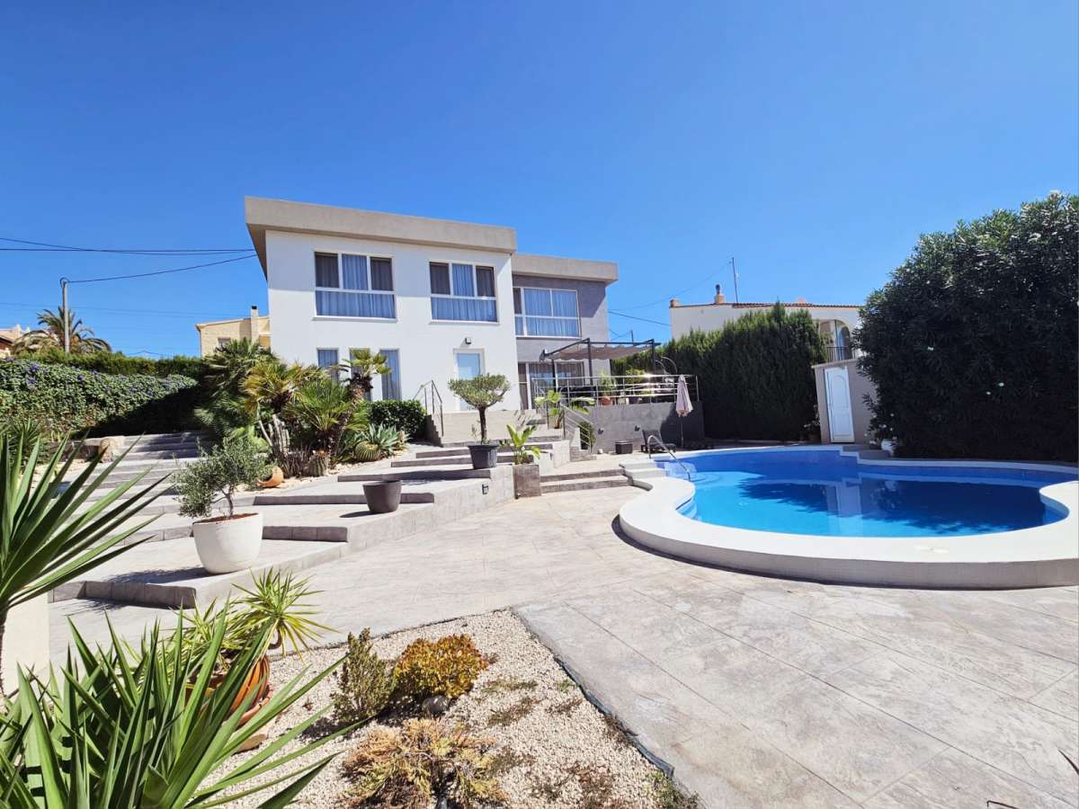 Modern villa near Les Bassetes in Calpe with private pool, garden area and spacious outdoor terrace