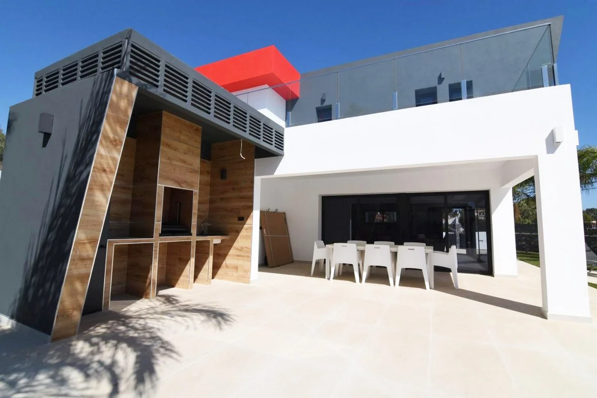 Modern villa terrace with summer kitchen and outdoor dining area in Calpe