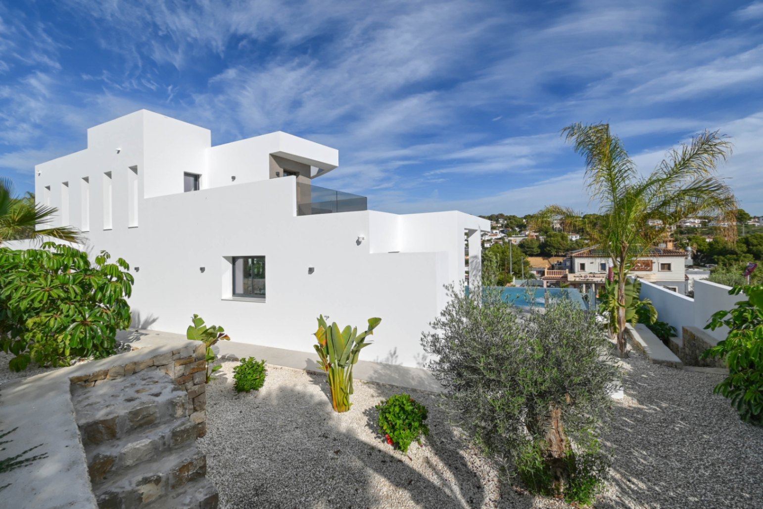Newly built luxury villa exterior with finished garden in Benissa