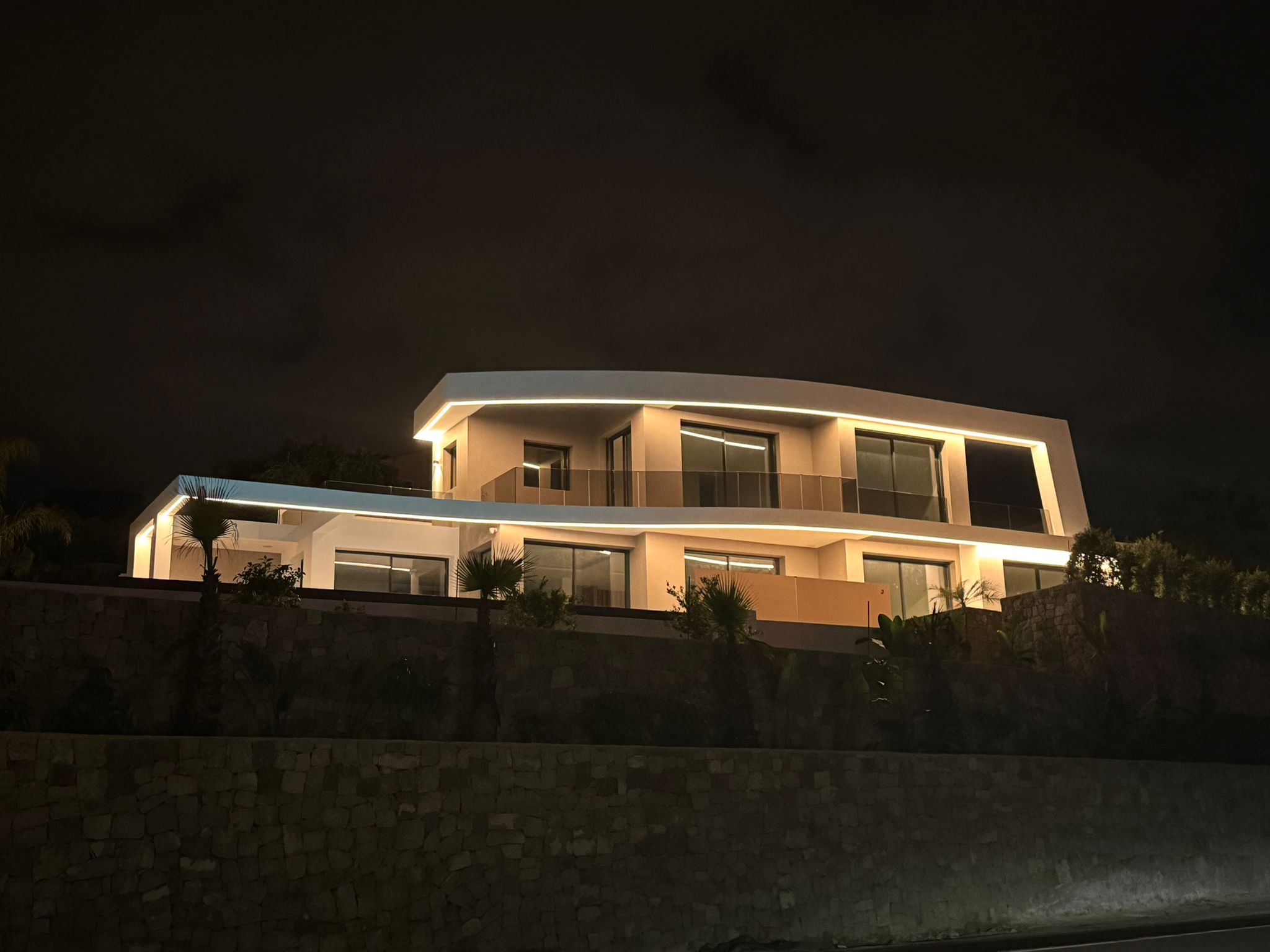 Newly built luxury villa in Benissa illuminated at night