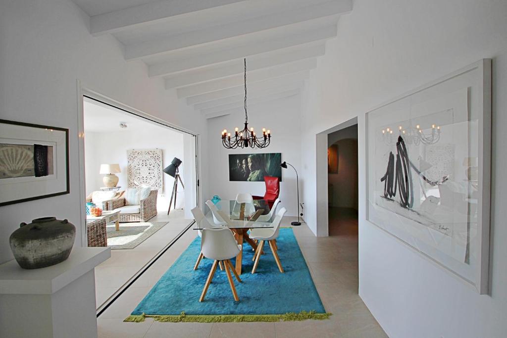 Open dining and lounge area with terrace access at villa in Moraira