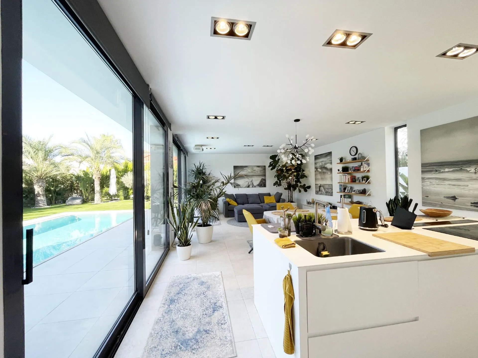 Open-plan kitchen and living area at modern villa in Calpe