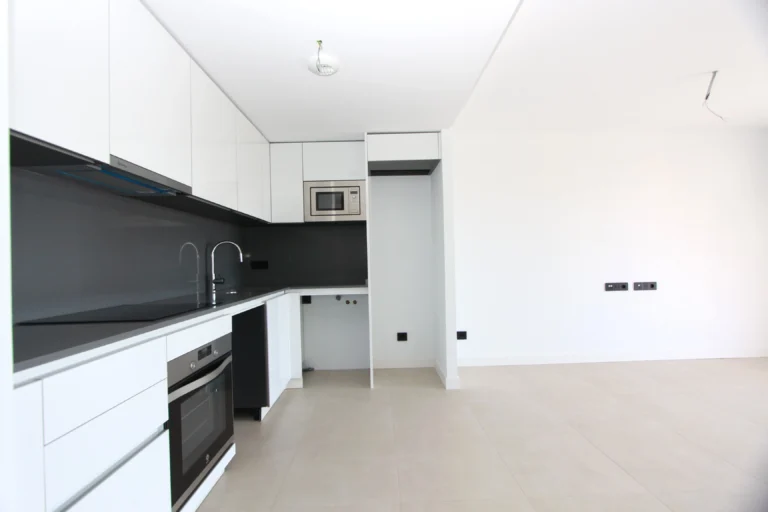 Open-plan kitchen and living space inside modern penthouse in Calpe