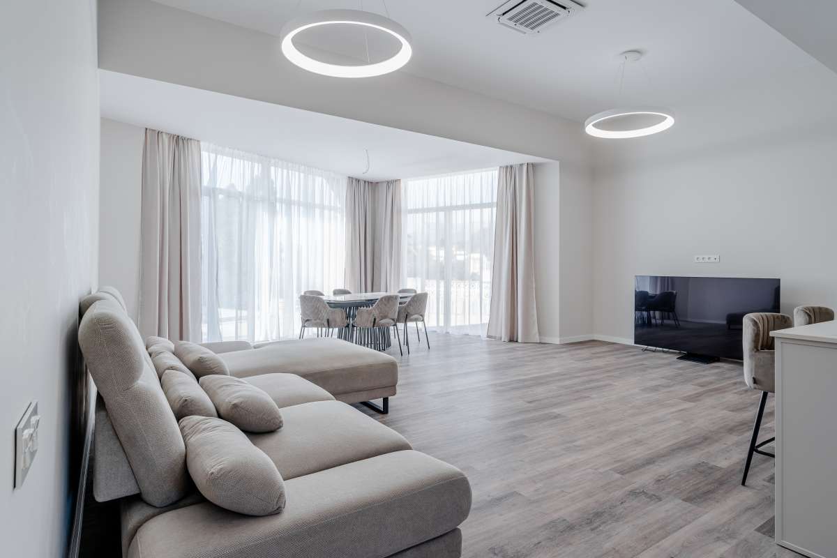 Open plan living room and dining area inside a new build villa for sale in Calpe near the coast
