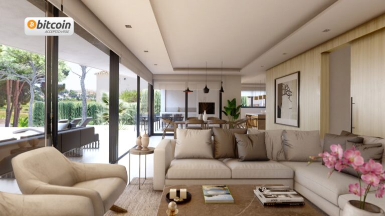Open-plan living room with large glass doors at luxury villa in Moraira