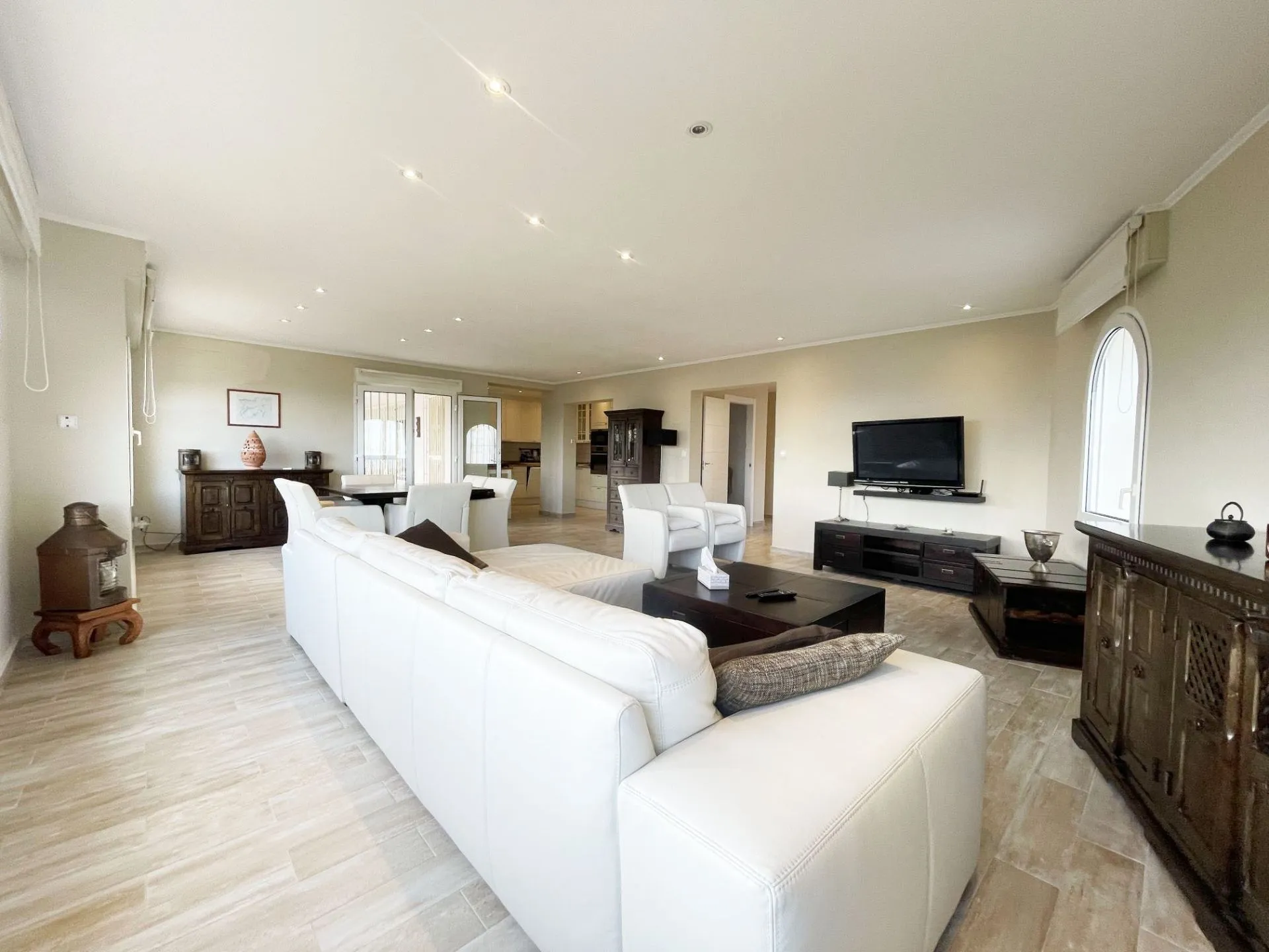 Open-plan lounge and dining area at renovated villa in Calpe