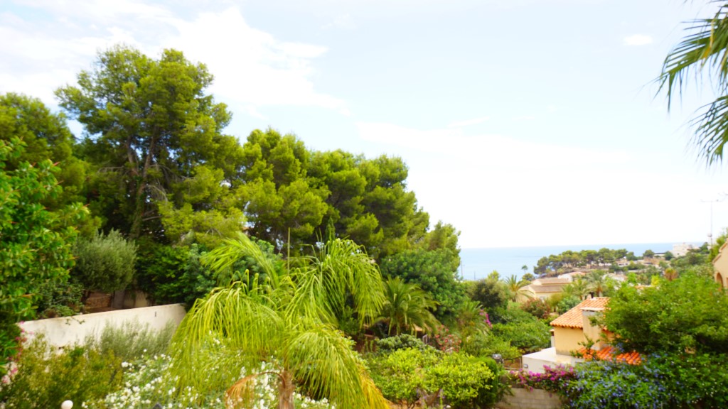 Open sea views and green surroundings from a villa in La Fustera, Benissa, near the Mediterranean coast.