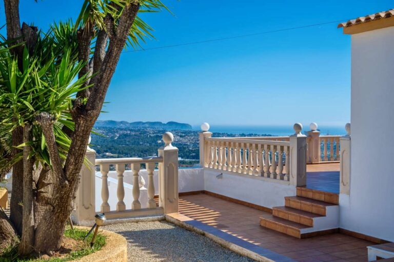 Open terrace with sea views, town views, and Mediterranean surroundings at a villa in Calpe.