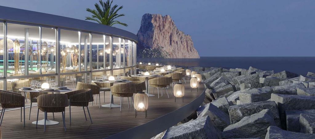 Outdoor dining terrace with sea views towards the Peñón de Ifach at a Mediterranean villa in Maryvilla, Calpe.