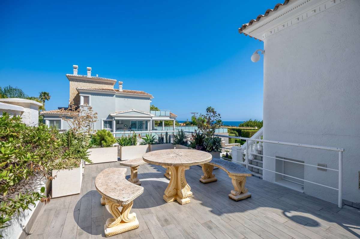 Outdoor seating terrace with open views and Mediterranean surroundings at a villa in Calpe.