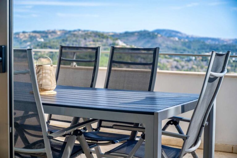 Outdoor terrace with seating and open mountain views at a modern spacious villa in Calpe