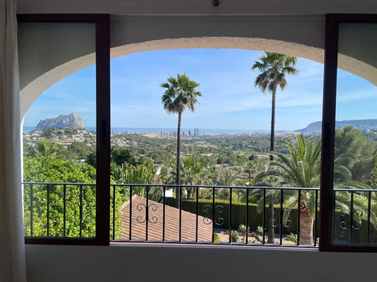 Panoramic sea views and Peñón de Ifach views from the master bedroom lounge area in a Calpe villa.