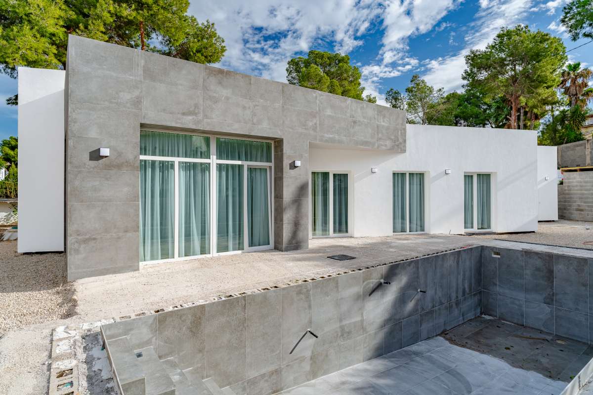 Pool terrace area at a modern new build villa for sale in Calpe near the coast and amenitie