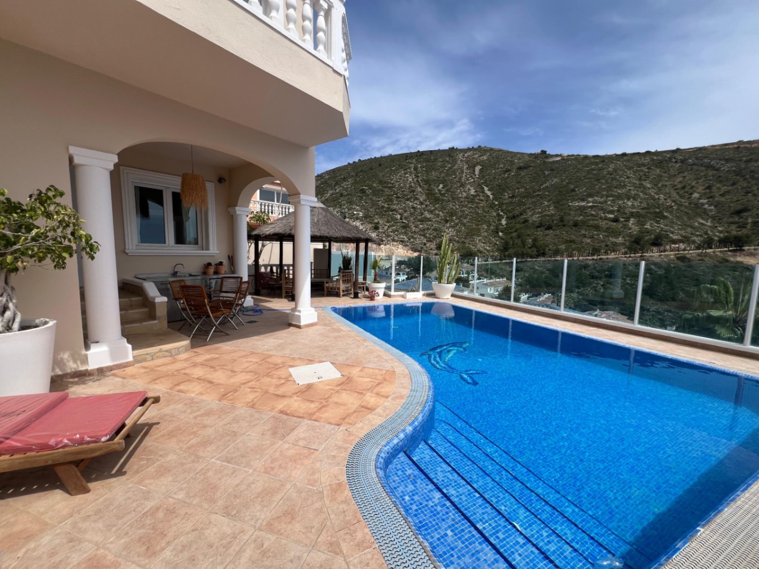 Pool terrace with sea and Portet valley views at modern villa in Moraira