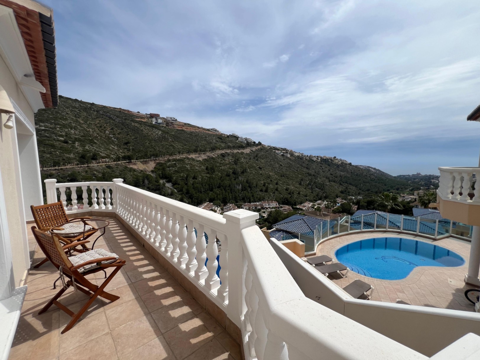 Pool terrace with sea and Portet valley views at villa in Moraira