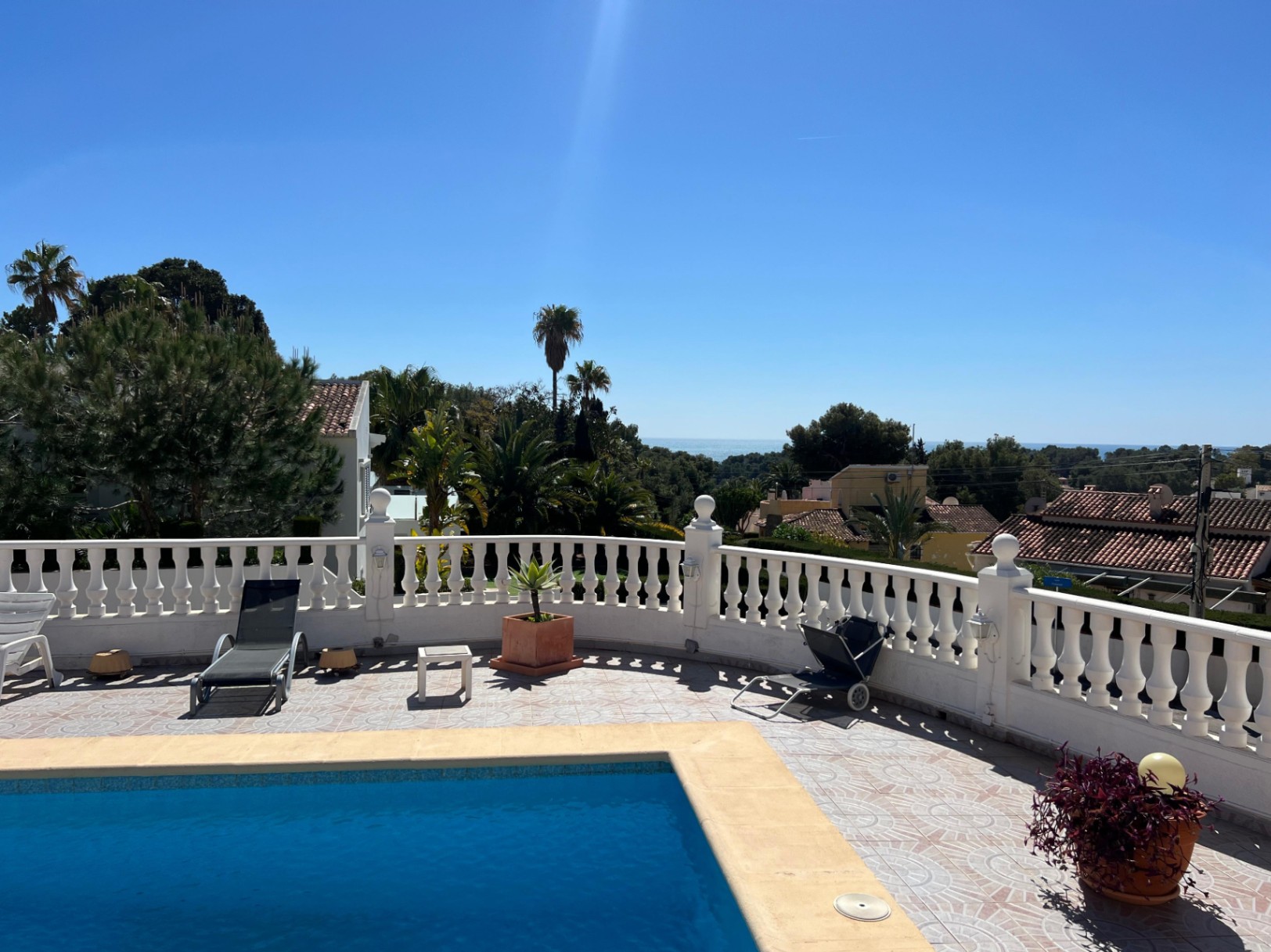 Pool terrace with sea views at Mediterranean villa in Buena Vista Benissa