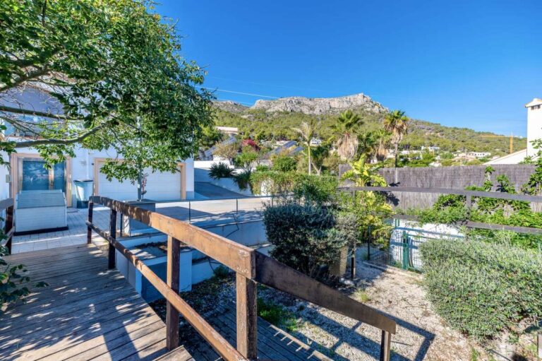 Private garden area at a large villa in Calpe with Mediterranean planting, mountain views and outdoor space