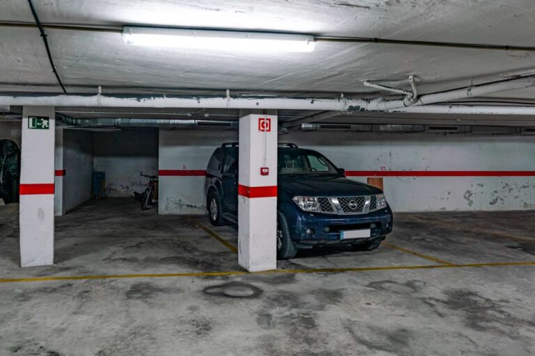 Private parking space at a duplex apartment near Les Platgetes Beach in Moraira inside a covered communal garage