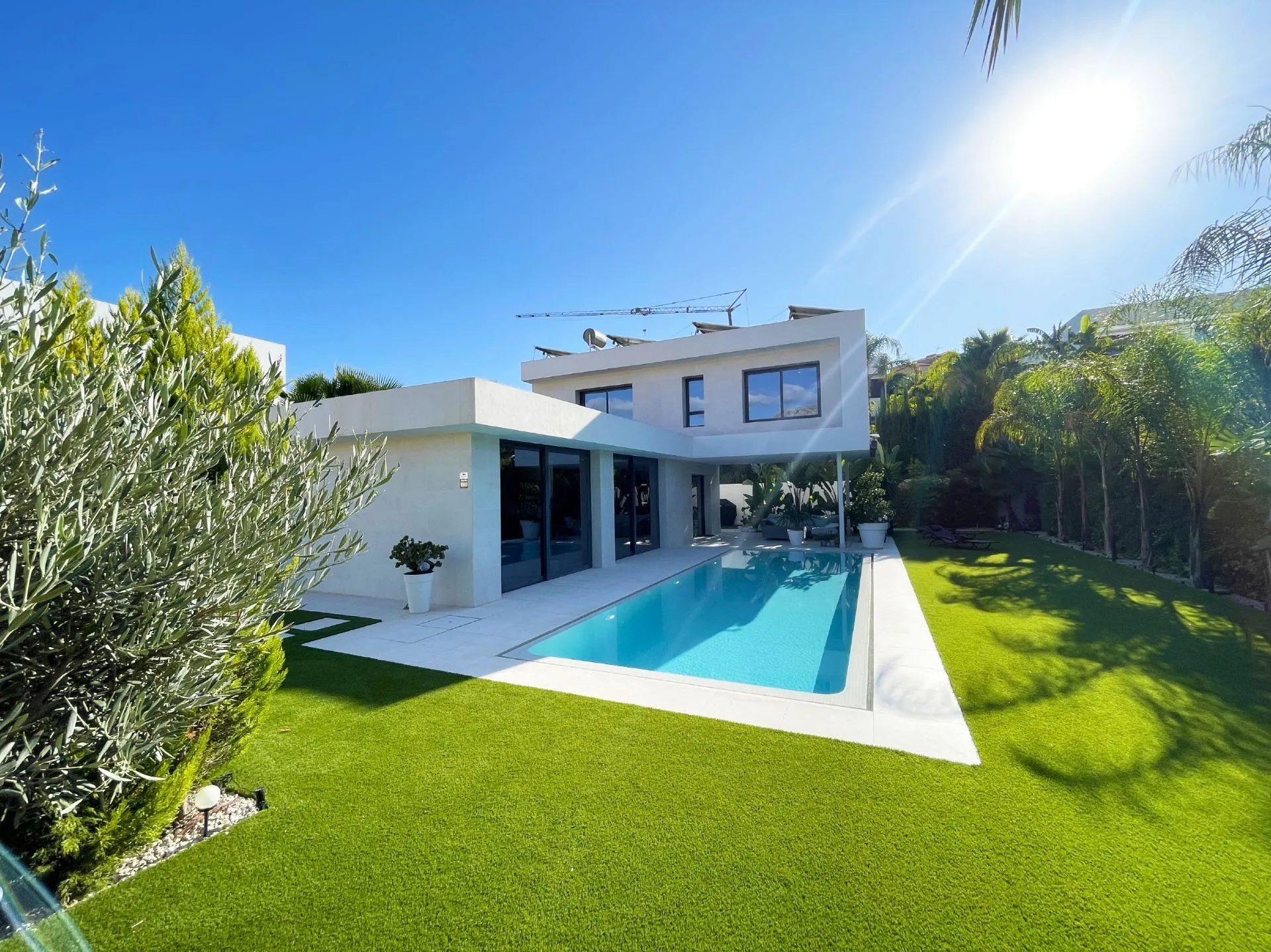 Private pool and garden at modern villa near Arenal Beach in Calpe