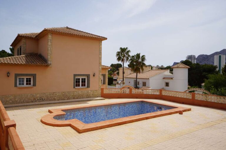 Private pool terrace with BBQ area at a Mediterranean villa in Calpe within a 10-minute walk of La Calalga Beach.