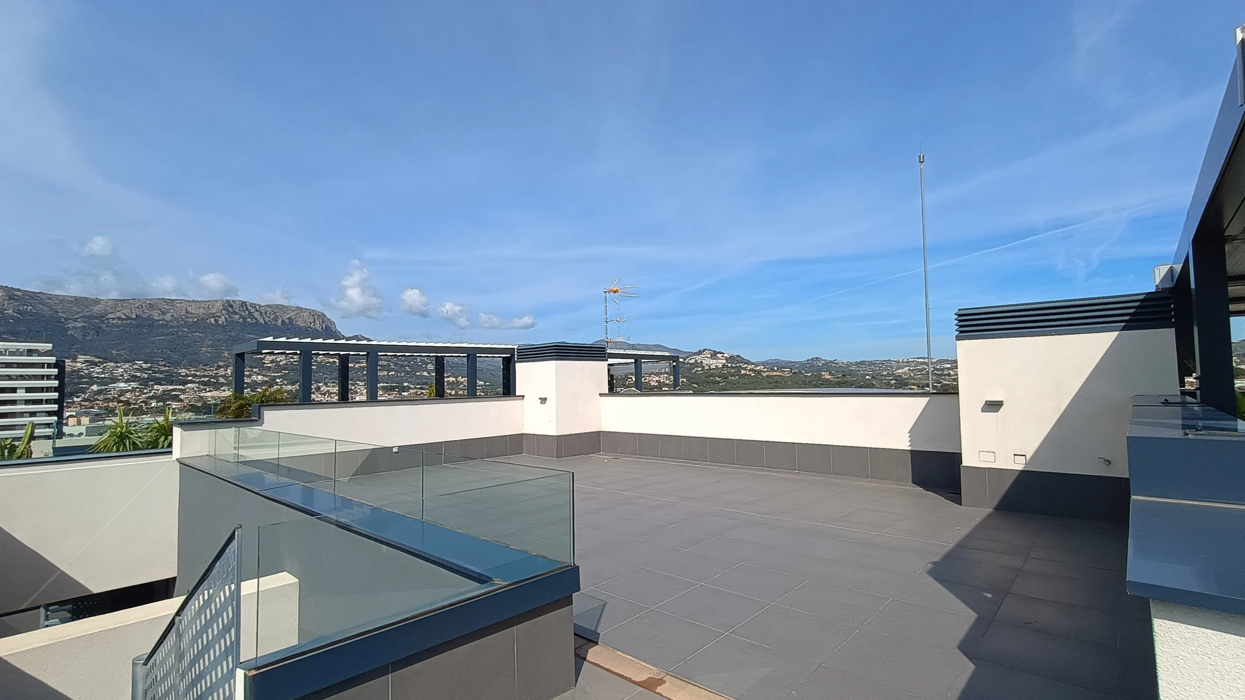 Private rooftop terrace with views towards the Peñón de Ifach in Calpe