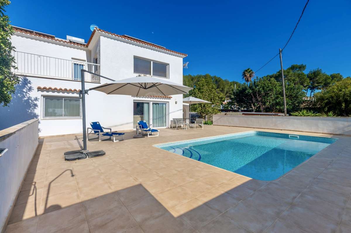 Private swimming pool and sunny terrace at a contemporary villa in a peaceful residential area of Calpe.