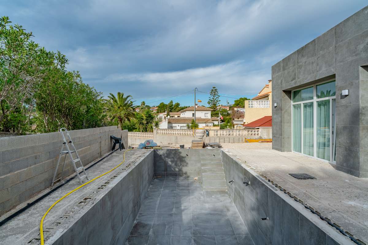 Private swimming pool area under construction at a new build villa for sale in Calpe