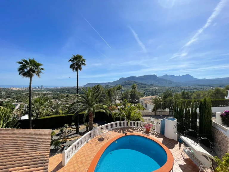 Private swimming pool with mountain, sea, and open valley views at a villa in Calpe.